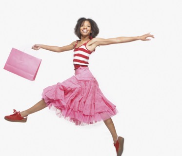 Full view portrait of woman in skirt dancing