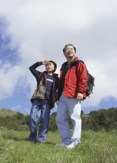 Asian father and son outdoors