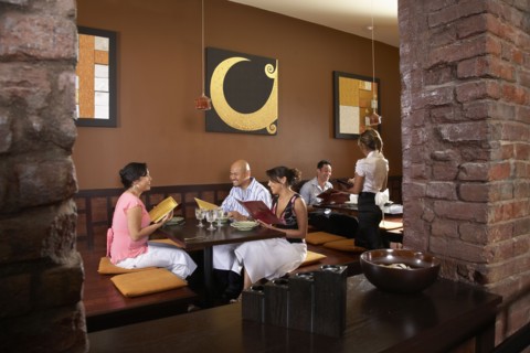 Multi-ethnic friends at restaurant