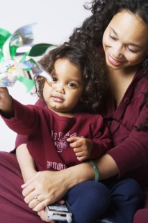 Mixed Race mother hugging son