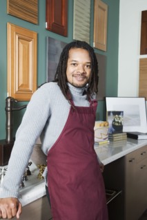 African sales clerk in home decor store