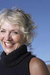 Senior Caucasian woman smiling outdoors