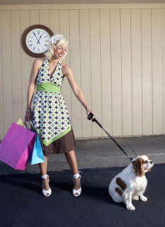 Caucasian woman with dog on sidewalk