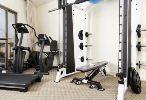 Weights and exercise machines in gym