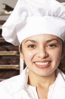Hispanic baker smiling