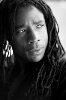 Serious mixed race man with dreadlocks