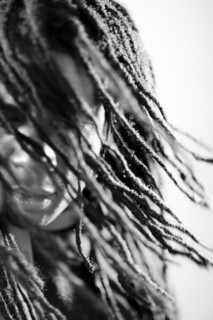 Mixed race man with long dreadlocks
