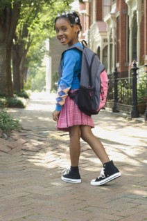 African girl wearing backpack