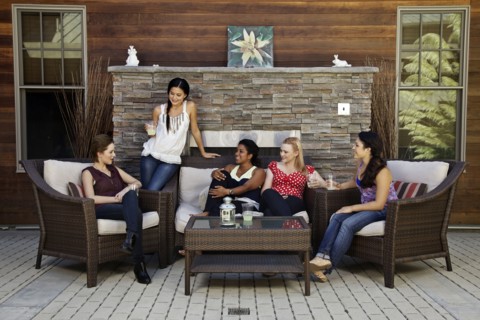 Women hanging out on patio living room