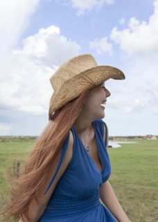 Caucasian woman in rural pasture