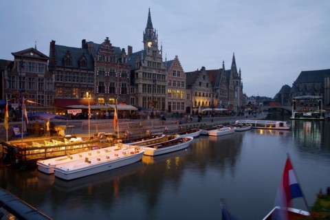 Quaint town and boats moored on canal