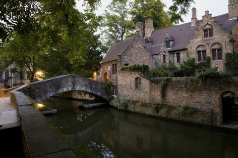 Quaint building and bridge over canal