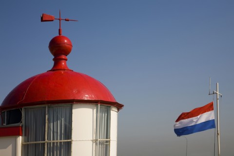 Red roof with weather vane