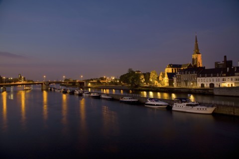Dutch canal and boats at night