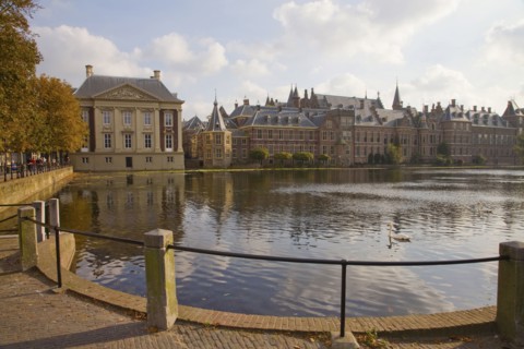 Ornate Dutch buildings near pond