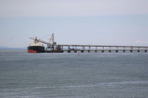 Container ship moored on dock