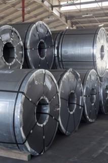 Metal rolls in warehouse