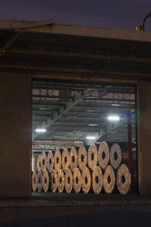 Metal rolls on warehouse loading dock
