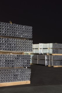 Pipes on pallets at night