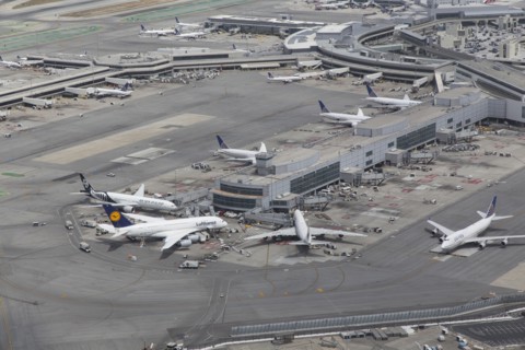 Aerial view of airplanes at airport terminal