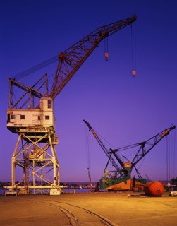 Cranes at harbor at night