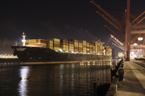 Cargo containers on freighter in port