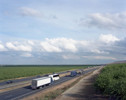 Trucks and cars driving on freeway