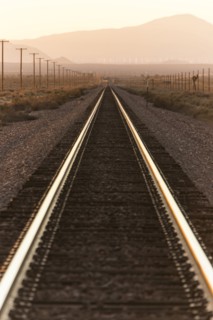 Railroad tracks in mountain landscape