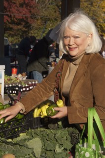 Older Caucasian woman shopping at farmer's market