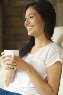 Woman having cup of coffee