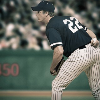 Caucasian baseball player ready to throw ball
