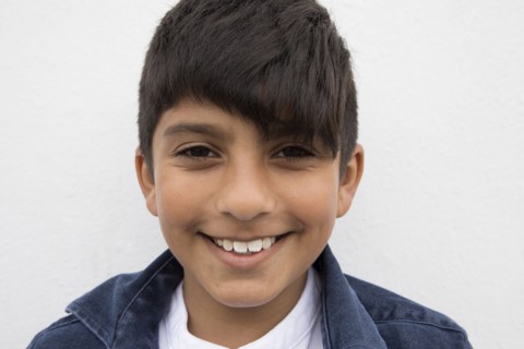 Close up of smiling Asian boy