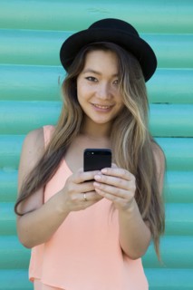 Asian woman using cell phone
