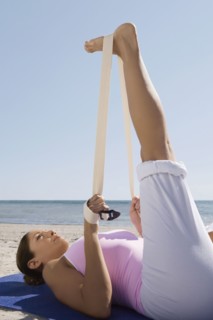 Hispanic woman practicing yoga