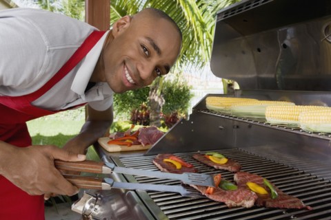 African man barbecuing