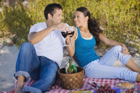 Hispanic couple having picnic