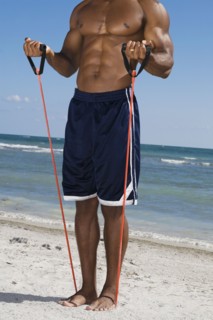 African man stretching with exercise band