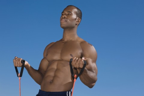 African man stretching with exercise band