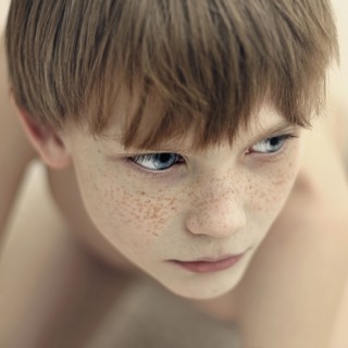 Close up of Caucasian boy's face