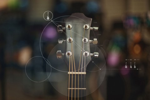 Close up of guitar overlaid with graphic design