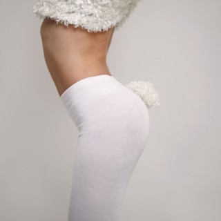 Midsection of Caucasian girl wearing rabbit costume