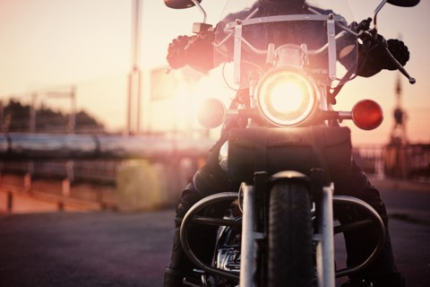 Caucasian man riding motorcycle