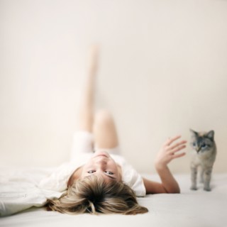 Caucasian girl laying on floor