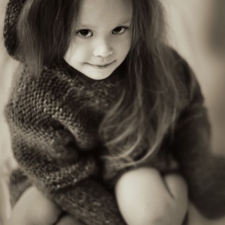 Caucasian girl wearing knitted sweater