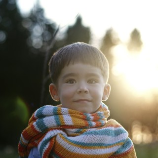 Portrait of Caucasian girl wearing multicolor scarf