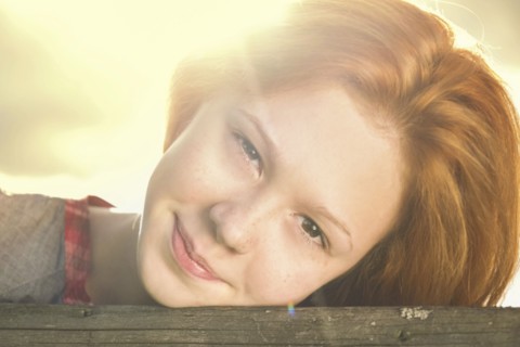 Close up of smiling Caucasian teenage girl