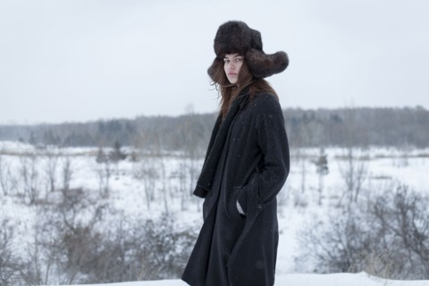 Serious Caucasian woman wearing fur hat and coat in winter