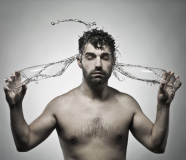 Man splashing himself with water