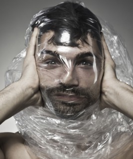 Man wrapped in plastic