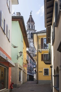 Church tower over village street